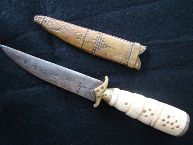 A carved bone handled knife, probably sailor-made, circa 1850